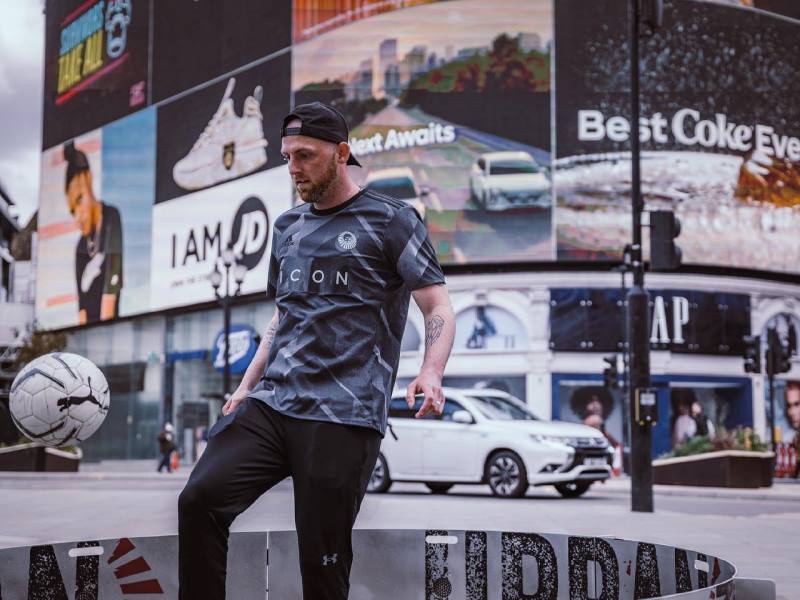 Icon Fast Feet 2 Male player at promotional hire event using exergame ICON Fast Feet football skills arena for interactive sports and leisure