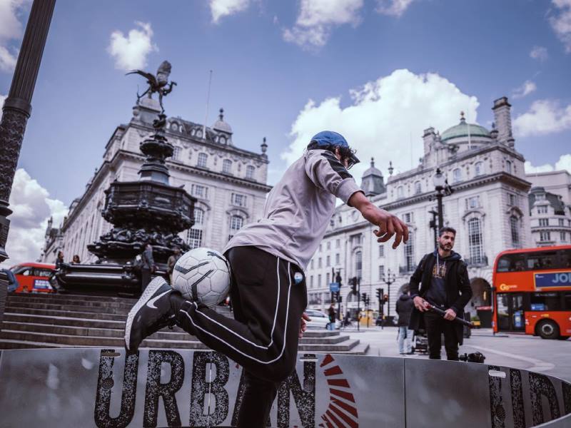 Icon Fast Feet 3 Young male at outdoor event playing exergame ICON Fast Feet football skills arena for interactive sports and leisure