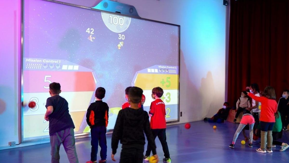 MultiBall 3 Group of kids playing with MultiBall exergames multi-sports games wall