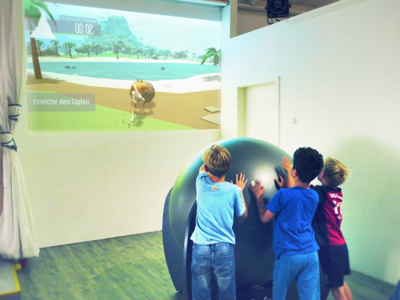 FoxBall (SisyFox) 2 Young boys exergaming with SisyFox aka FoxBall Physical Gaming platform supplied for Interactive Sports and Leisure