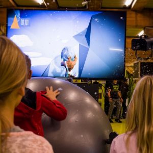 Event Hire 14 Kids play and watching exergaming with SisyFox aka FoxBall Physical Gaming platform for Interactive Sports and Leisure