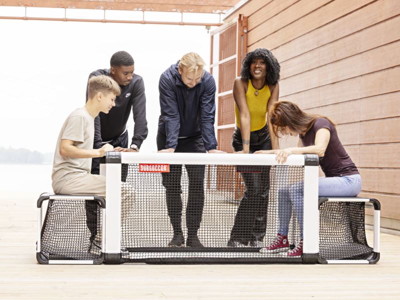 Subsoccer® 2 Young male and female compete with Subsoccer® table football game