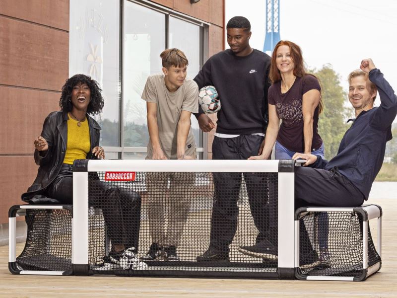 Subsoccer® 3 Group fun with diverse players enjoying Subsoccer® table football game for interactive sports and leisure