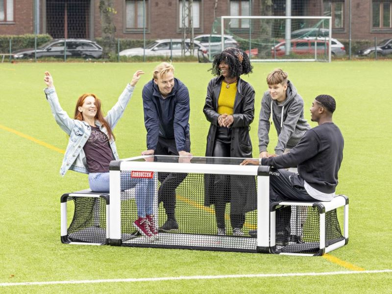 Subsoccer® 5 Female celebrates win playing Subsoccer® table football game for interactive sports and leisure