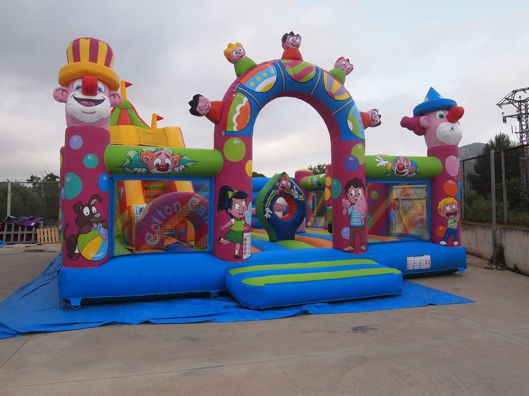 Inflatables 4 Circus themed inflatable activity park structure featuring clowns and big top
