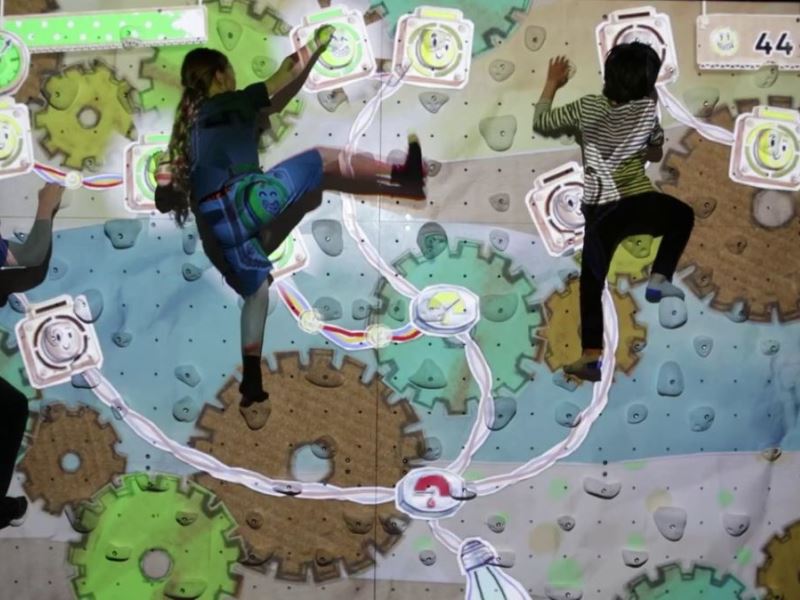 ValoClimb 7 Young climbers active on Valo Motion ValoClimb interactive climbing wall with Short Circuit game