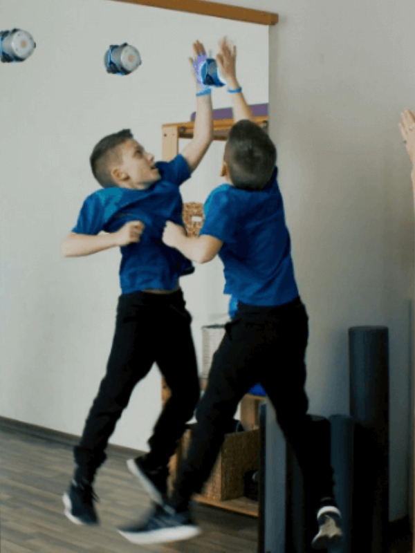 BlazePod 1 Young male in physiotherapy session uses BlazePod Flash Reflex Training System